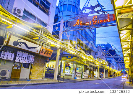 Atami Ginza shopping street at dusk, view from the sea side to the mountain side Atami Ginza shopping street at dusk, view from the sea side to the mountain side 132426823