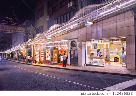 Atami Ginza shopping street at dusk, view from the mountain side to the sea side Atami Ginza shopping street at dusk, view from the mountain side to the sea side 132426828