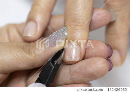 A woman getting her nails done A woman getting her nails done 132426983