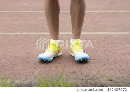Child running with spikes 132427072