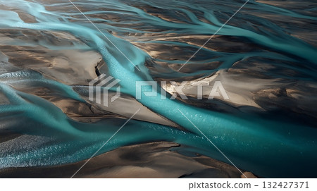 Braided River System Aerial View of Teal Water Channels Through Sandy Plains Braided River System Aerial View of Teal Water Channels Through Sandy Plains 132427371