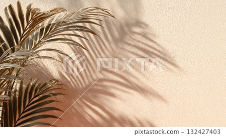 Golden Palm Leaves Against Textured Peach Wall Casting Shadow, Tropical Minimalist Aesthetic Golden Palm Leaves Against Textured Peach Wall Casting Shadow, Tropical Minimalist Aesthetic 132427403