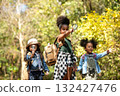Group family children walking for explore and find directions in the camping jungle nature and adventure.  132427476
