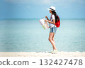 Happy traveler and tourism young women travel summer on the beach.  132427478