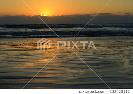 The sea stained in the morning sun 132428112