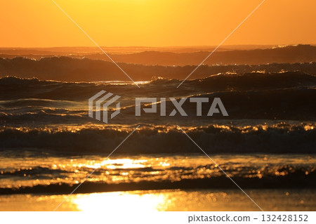 The sea stained in the morning sun 132428152