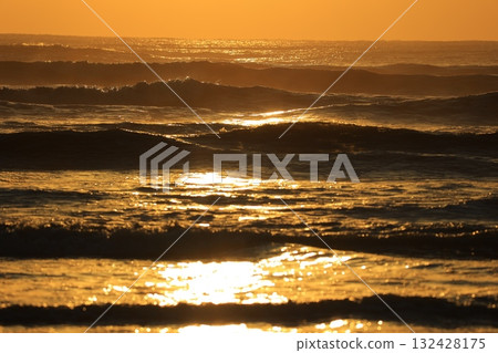 The sea stained in the morning sun 132428175