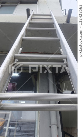Aluminum ladder ladder building exterior vertical metal rungs facade pipe window Aluminum ladder ladder building exterior vertical metal rungs facade pipe window 132428562