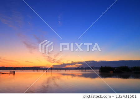 Asahi reflected on the surface of the water Asahi reflected on the surface of the water 132431501