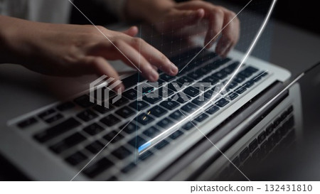 Hands typing on sleek laptop keyboard with digital data visualization, representing technology, communication, and modern workspace concepts Copula 132431810