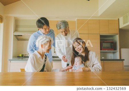 Three-generation family gathering at home Three-generation family gathering at home 132432569