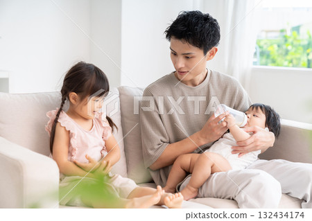 Father, daughter and baby milk Father, daughter and baby milk 132434174