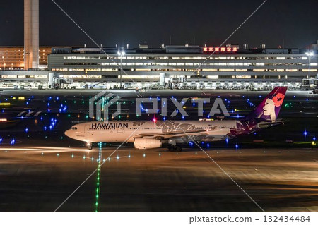Haneda Airport at night, airplane taxiing, Ota Ward, Tokyo 132434484