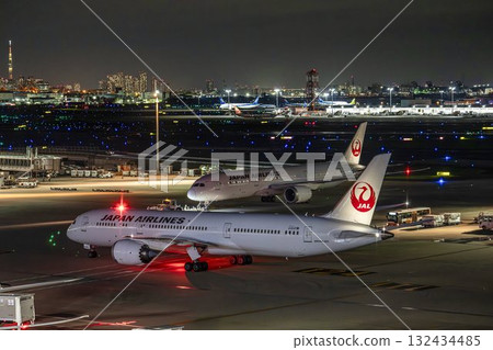 Haneda Airport at night, airplane taxiing, Ota Ward, Tokyo 132434485