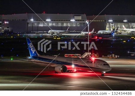 Haneda Airport at night, airplane taxiing, Ota Ward, Tokyo Haneda Airport at night, airplane taxiing, Ota Ward, Tokyo 132434486