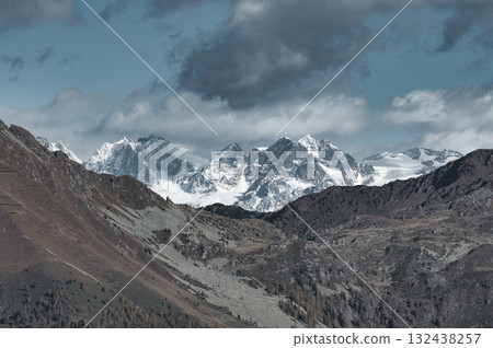 Alpine landscape compresses snowfall in autumn Alpine landscape compresses snowfall in autumn 132438257