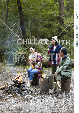 Family having a bonfire at a campsite 132440820