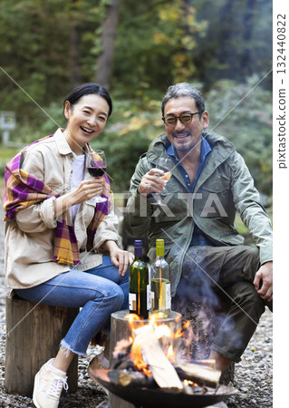 Family having a bonfire at a campsite 132440822