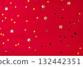 Gold confetti on red background. 132442351
