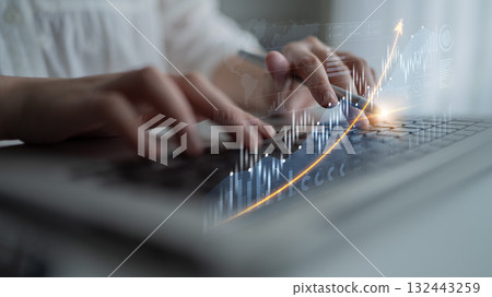 Person Typing on Laptop with Financial Graph Overlay and Data Analysis, Business Growth Concept in Modern Workspace Environment Scalp Person Typing on Laptop with Financial Graph Overlay and Data Analysis, Business Growth Concept in Modern Workspace Environment Scalp 132443259