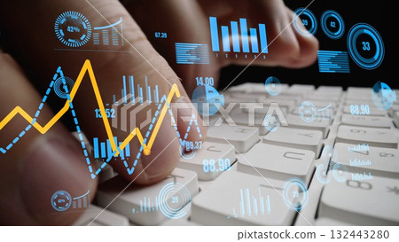 Detailed analysis of data visualization showing hands typing on keyboard with charts, graphs, and statistics overlaying for digital marketing and finance concept xenic Detailed analysis of data visualization showing hands typing on keyboard with charts, graphs, and statistics overlaying for digital marketing and finance concept xenic 132443280