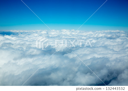 Aerial fluffy clouds view from high like a sea Aerial fluffy clouds view from high like a sea 132443532