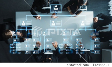 Collaborative Business Meeting with Digital Interfaces Displaying Organizational Structures and Team Profiles in Modern Office Environment. Raster Collaborative Business Meeting with Digital Interfaces Displaying Organizational Structures and Team Profiles in Modern Office Environment. Raster 132443595