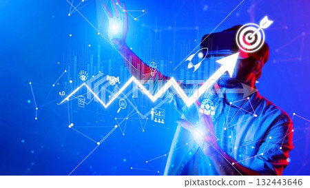 Young man wearing virtual reality headset interacting with digital elements showing growth, innovation, and technology in a futuristic environment. Raster 132443646