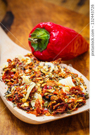 Colored spices for pasta mix on wooden spoon Colored spices for pasta mix on wooden spoon 132443726