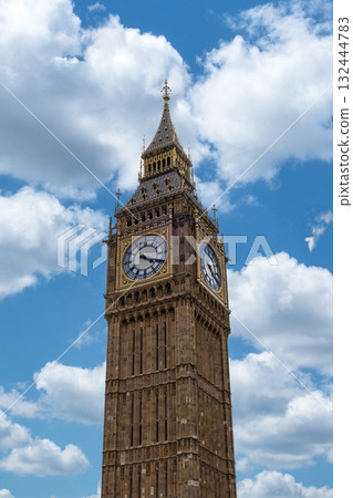 Elizabeth Tower clock in London against blue sky and clouds, iconic UK landmark Elizabeth Tower clock in London against blue sky and clouds, iconic UK landmark 132444783