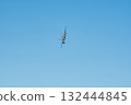 Aggressor demonstrating maneuvering skills at an air show 132444845