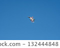 Aggressor demonstrating maneuvering skills at an air show 132444848