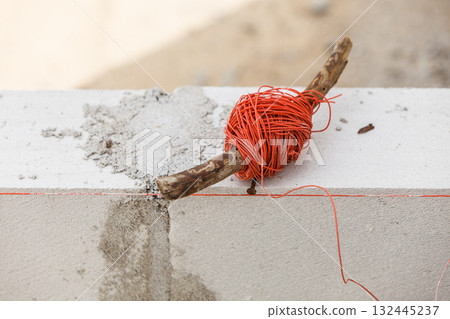 String net on stick, spirit level String net on stick, spirit level 132445237