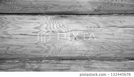 Detailed close-up of a gray wooden log showing natural grain patterns 132445676