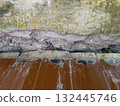 Opening in wall formed after removing baseboard during renovation old apartment 132445746