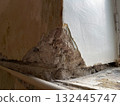 Corner wall collapsed during renovation of old apartment 132445747