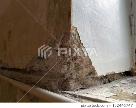 Corner wall collapsed during renovation of old apartment Corner wall collapsed during renovation of old apartment 132445747