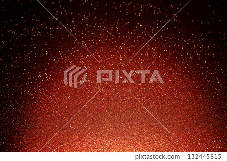 Radiant red texture glows at base as golden sparkles rise into dark tones with fiery depth 132445815