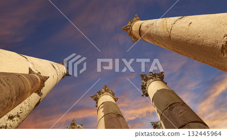 Roman Columns in the Jordanian city of Jerash (Gerasa of Antiquity), capital and largest city of Jerash Governorate, Jordan. Against the background of a beautiful sky with clouds 132445964