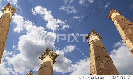 Roman Columns in the Jordanian city of Jerash (Gerasa of Antiquity), capital and largest city of Jerash Governorate, Jordan. Against the background of a beautiful sky with clouds 132445967