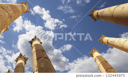 Roman Columns in the Jordanian city of Jerash (Gerasa of Antiquity), capital and largest city of Jerash Governorate, Jordan. Against the background of a beautiful sky with clouds 132445975