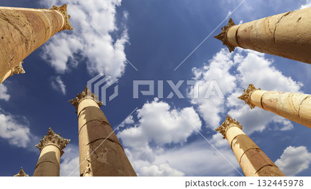 Roman Columns in the Jordanian city of Jerash (Gerasa of Antiquity), capital and largest city of Jerash Governorate, Jordan. Against the background of a beautiful sky with clouds 132445978