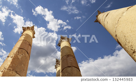 Roman Columns in the Jordanian city of Jerash (Gerasa of Antiquity), capital and largest city of Jerash Governorate, Jordan. Against the background of a beautiful sky with clouds 132445983