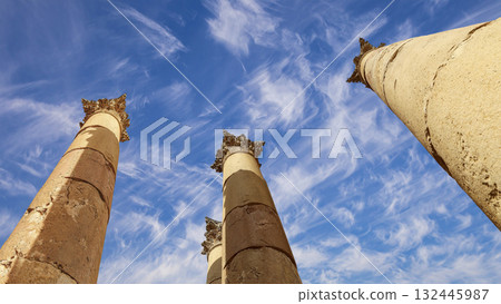 Roman Columns in the Jordanian city of Jerash (Gerasa of Antiquity), capital and largest city of Jerash Governorate, Jordan. Against the background of a beautiful sky with clouds 132445987