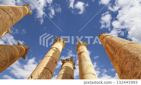 Roman Columns in the Jordanian city of Jerash (Gerasa of Antiquity), capital and largest city of Jerash Governorate, Jordan. Against the background of a beautiful sky with clouds 132445993