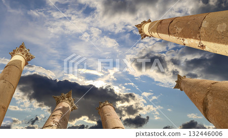 Roman Columns in the Jordanian city of Jerash (Gerasa of Antiquity), capital and largest city of Jerash Governorate, Jordan. Against the background of a beautiful sky with clouds 132446006