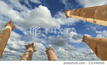 Roman Columns in the Jordanian city of Jerash (Gerasa of Antiquity), capital and largest city of Jerash Governorate, Jordan. Against the background of a beautiful sky with clouds Roman Columns in the Jordanian city of Jerash (Gerasa of Antiquity), capital and largest city of Jerash Governorate, Jordan. Against the background of a beautiful sky with clouds 132446008