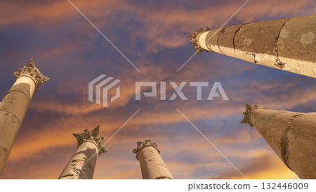 Roman Columns in the Jordanian city of Jerash (Gerasa of Antiquity), capital and largest city of Jerash Governorate, Jordan. Against the background of a beautiful sky with clouds Roman Columns in the Jordanian city of Jerash (Gerasa of Antiquity), capital and largest city of Jerash Governorate, Jordan. Against the background of a beautiful sky with clouds 132446009