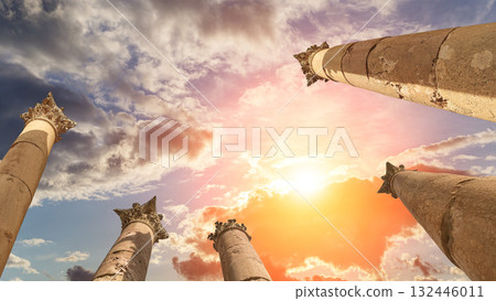 Roman Columns in the Jordanian city of Jerash (Gerasa of Antiquity), capital and largest city of Jerash Governorate, Jordan. Against the background of a beautiful sky with clouds Roman Columns in the Jordanian city of Jerash (Gerasa of Antiquity), capital and largest city of Jerash Governorate, Jordan. Against the background of a beautiful sky with clouds 132446011