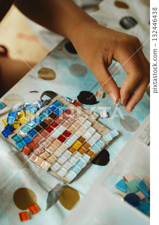 Child Creating a Colorful Mosaic Artwork Child Creating a Colorful Mosaic Artwork 132446438
